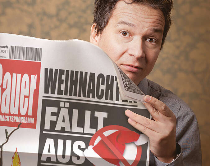 Mann mit Zeitung (Foto: Stephan Bauer)