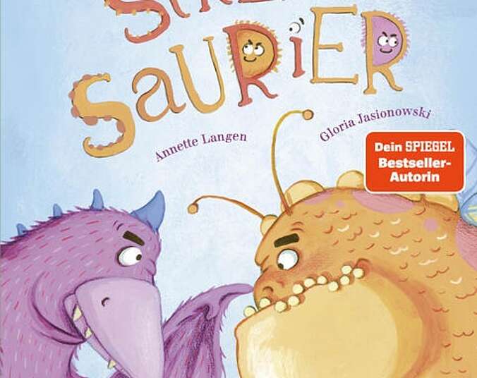 Zwei Dinosaurier stehen sich Aug in Aug gegenüber.